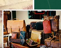 A display of finished leather bags and goods made by trainees